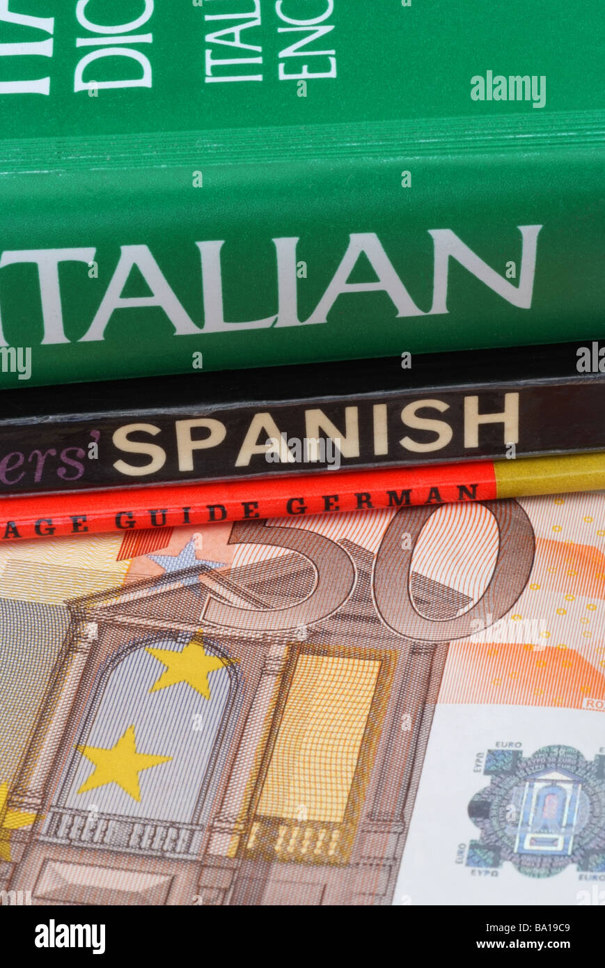 WÄHRUNG UND SPRACHLEHRBÜCHER Stockfoto