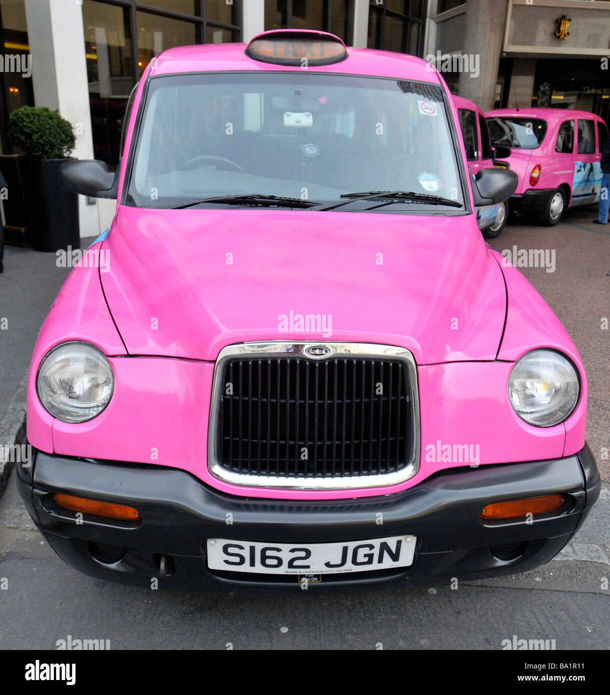 Rosa London Taxi Taxi Stockfoto