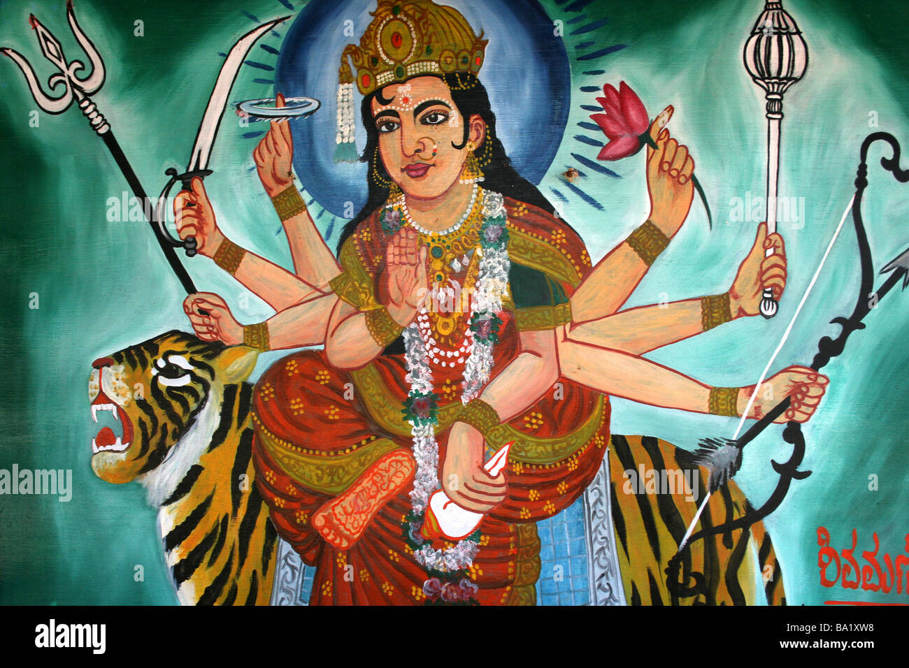 Farbenfrohe Gemälde der Hindu-Göttin Durga reitet ein Tiger Stockfoto