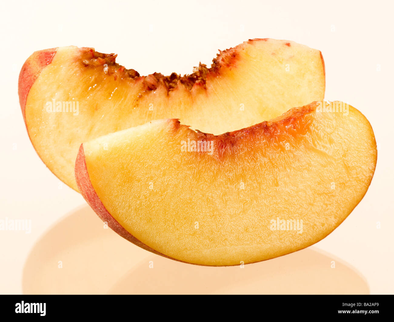 Pfirsich-Stück Pfirsich, Prunus Persica prahlte, spaltet Stück Obst Obst Kernobst Steinobst Symbol Ernährung gesund Stockfoto