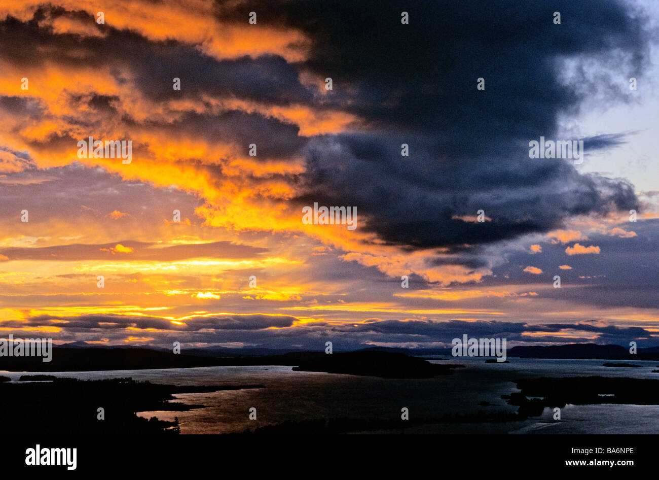 Schweden, Dalarna Grafschaft, Wolken bei Sonnenuntergang über Siljan See Stockfoto