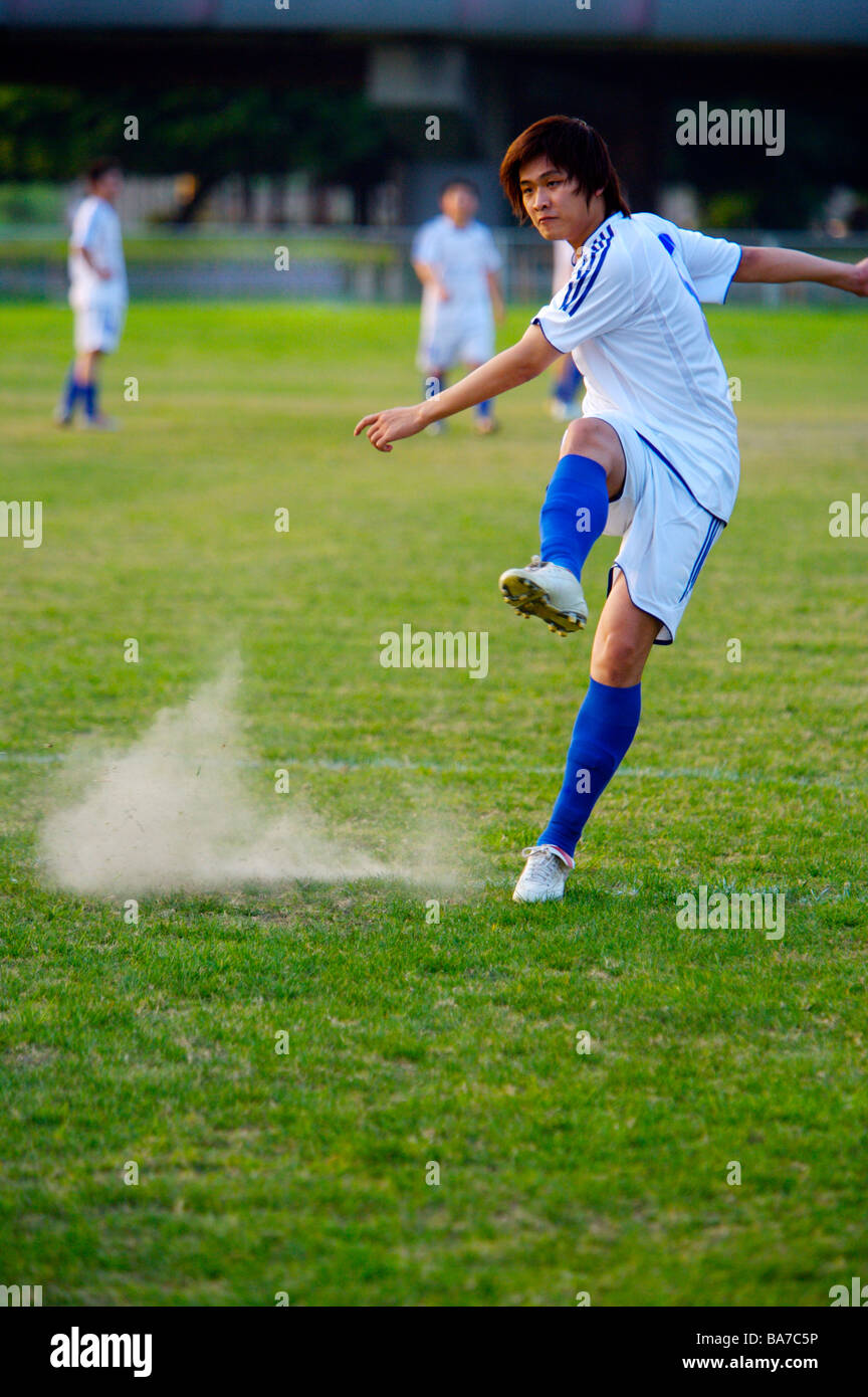 Fußballspieler und-Trainer Stockfoto