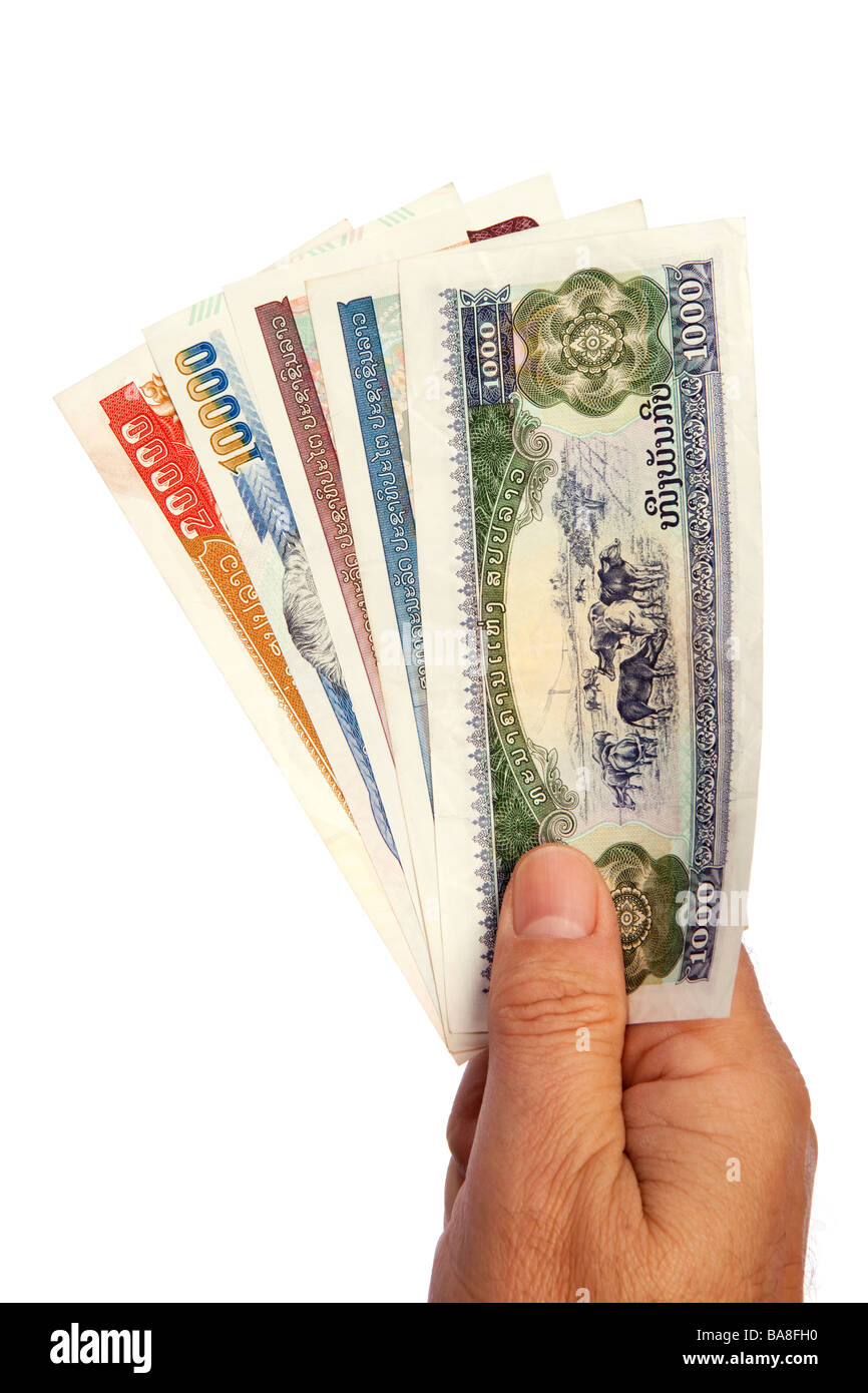 Geld männliche Hand, die Handvoll Lao Währung Stockfoto