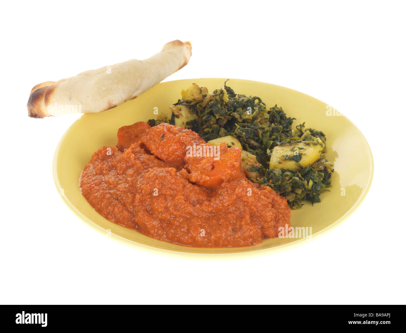 Chicken Tikka Masala mit Sag Aloo Stockfoto