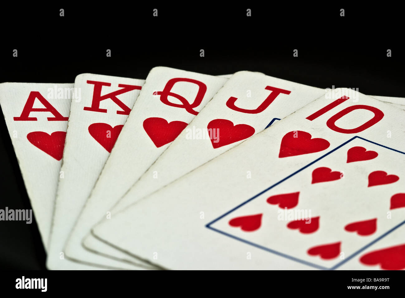 Spielkarten mit einem royal Straight Flush im Herzen Anzug Stockfoto