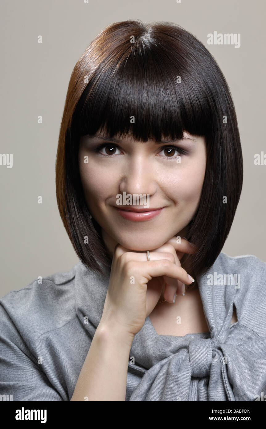 Porträt der lächelnde junge Geschäftsfrau Stockfoto