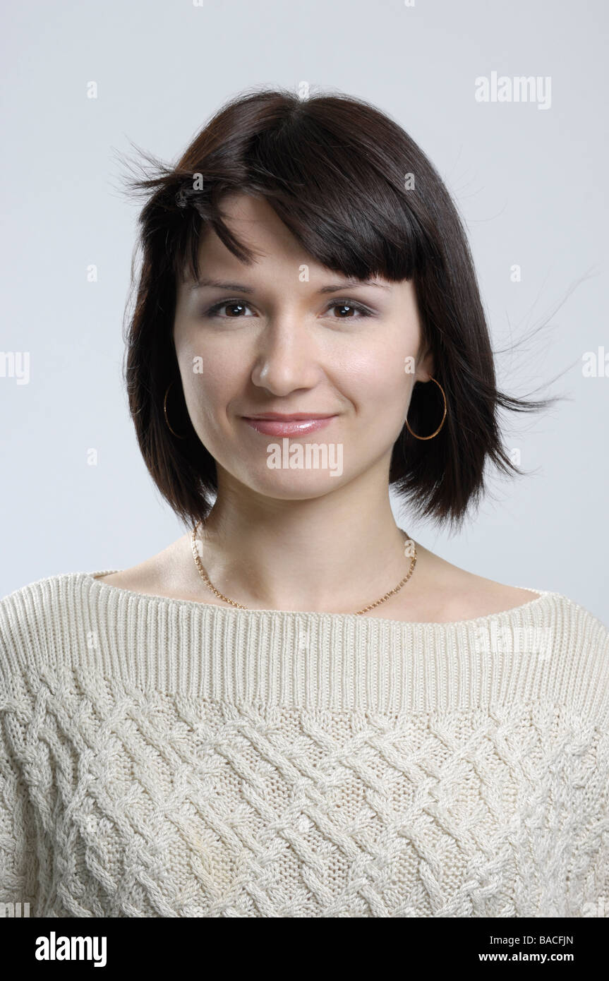 Portrait von lächelnden jungen Frau Stockfoto
