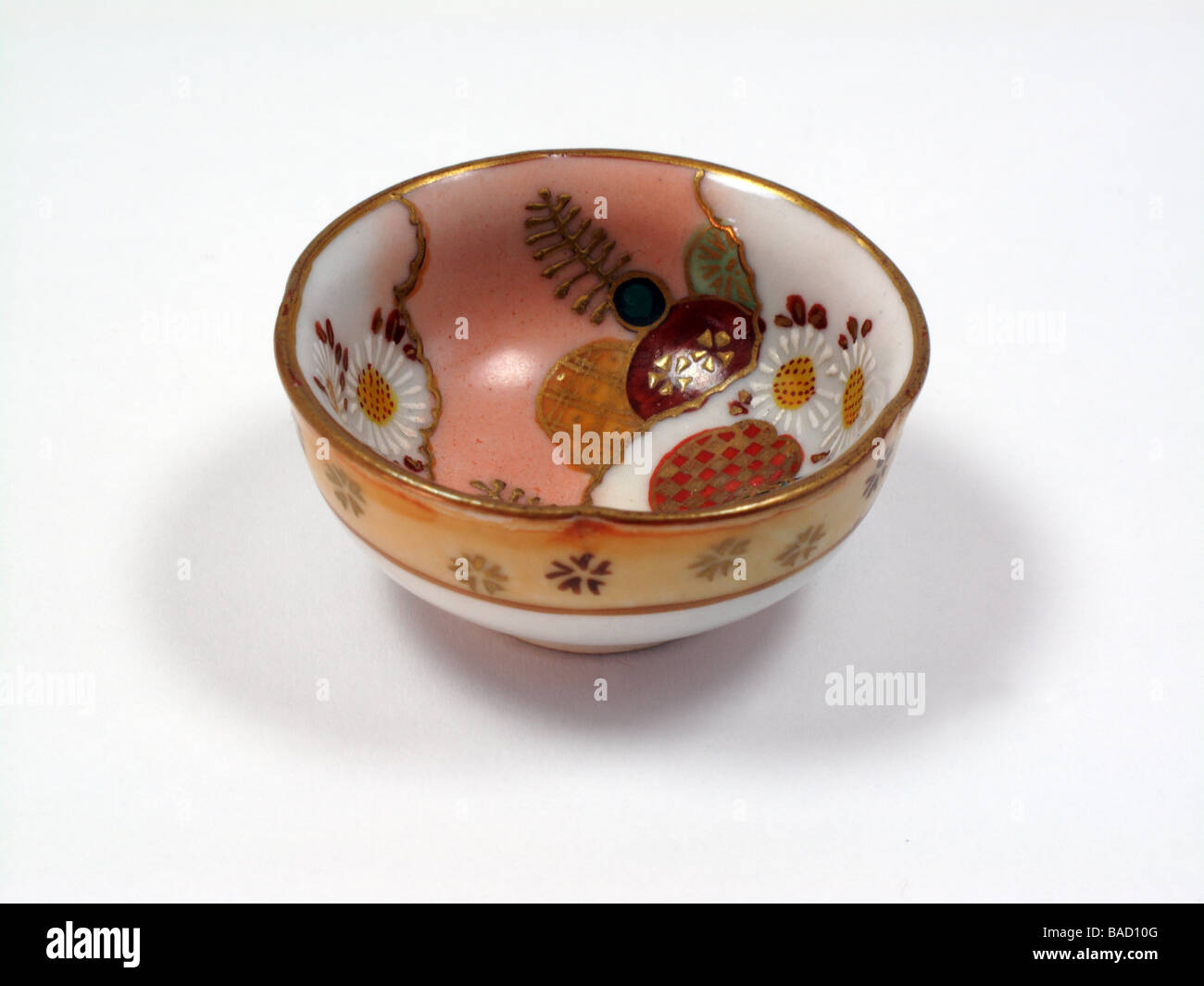 Antike japanische Keramik Willen Porzellantasse um 1900 Stockfoto