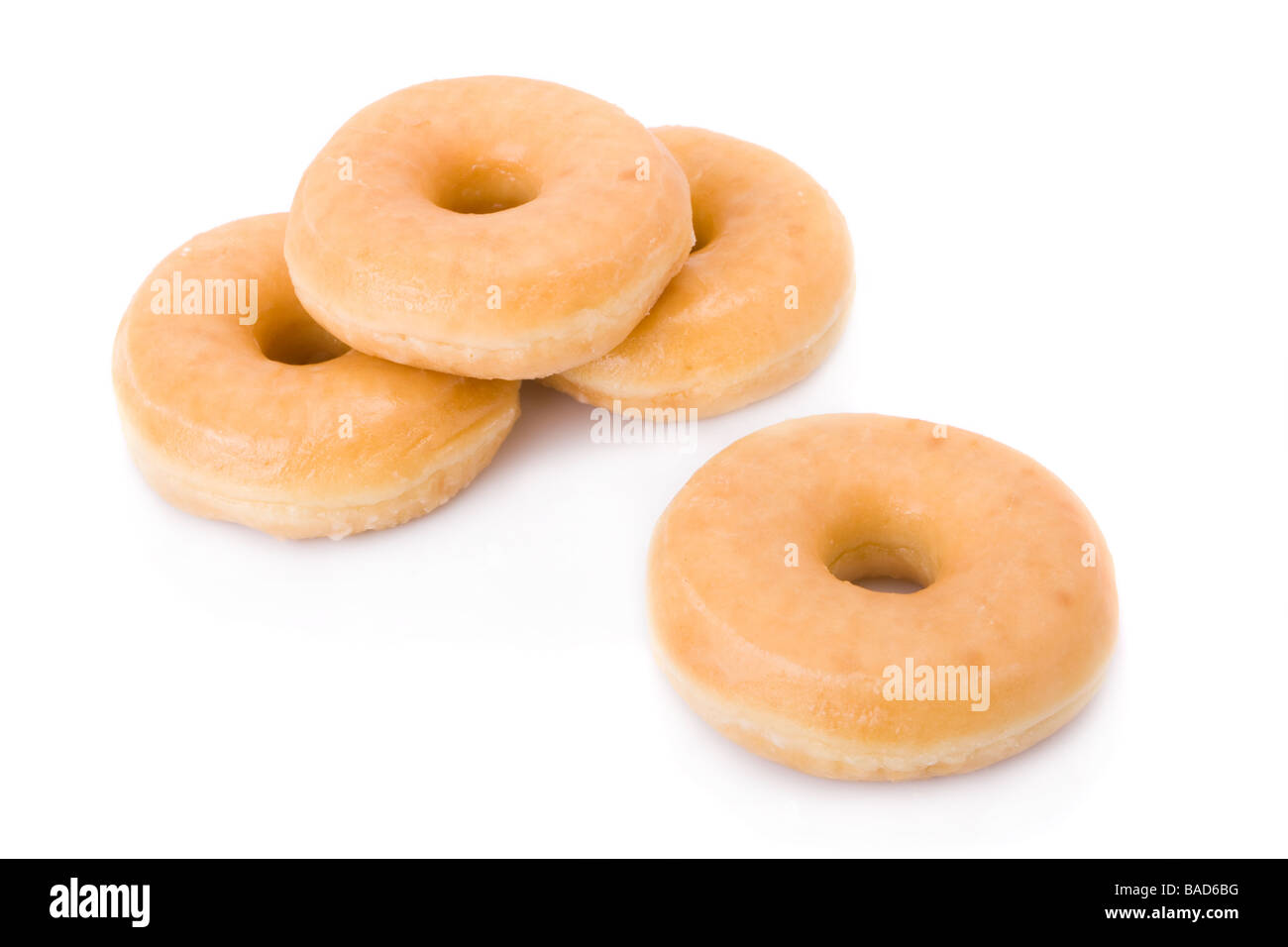 Drei Berliner oder Krapfen aufgetürmt isoliert auf weiss Stockfoto Drei Berliner oder Krapfen aufgetürmt isoliert auf weiss Stockfoto