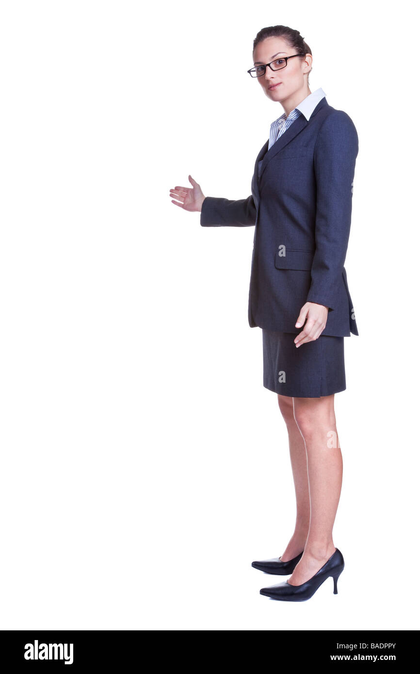 Businesswoamn mit dem Arm in eine einladende Geste isoliert auf weißem Hintergrund Stockfoto