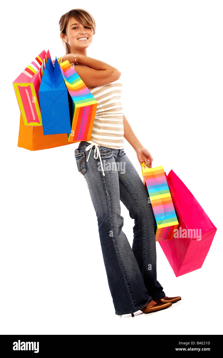 Mädchen lächelnd und Einkaufstaschen isoliert auf einem weißen Hintergrund Stockfoto