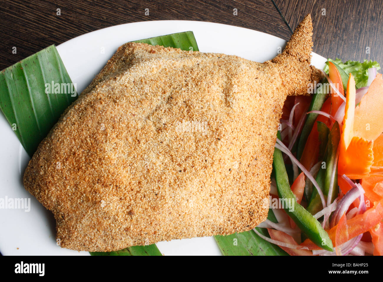 Pur Bhara Pomfret Fry ist eine gefüllte Pomfret mit würzigen Kokos Füllung beschichtet mit Grieß & Reis Mehl tief gebraten Stockfoto