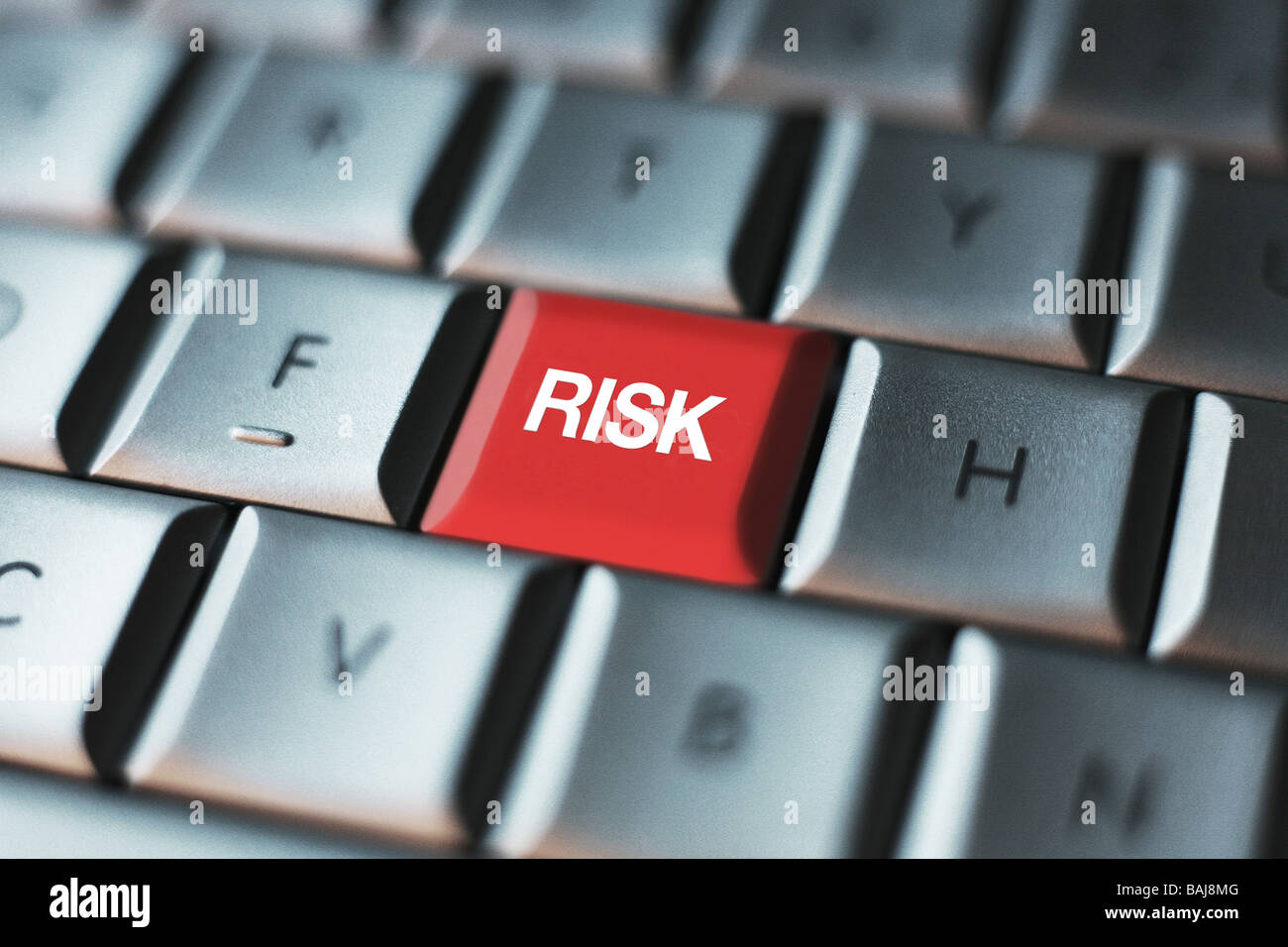 Risiko-Taste auf einer Computertastatur Stockfoto