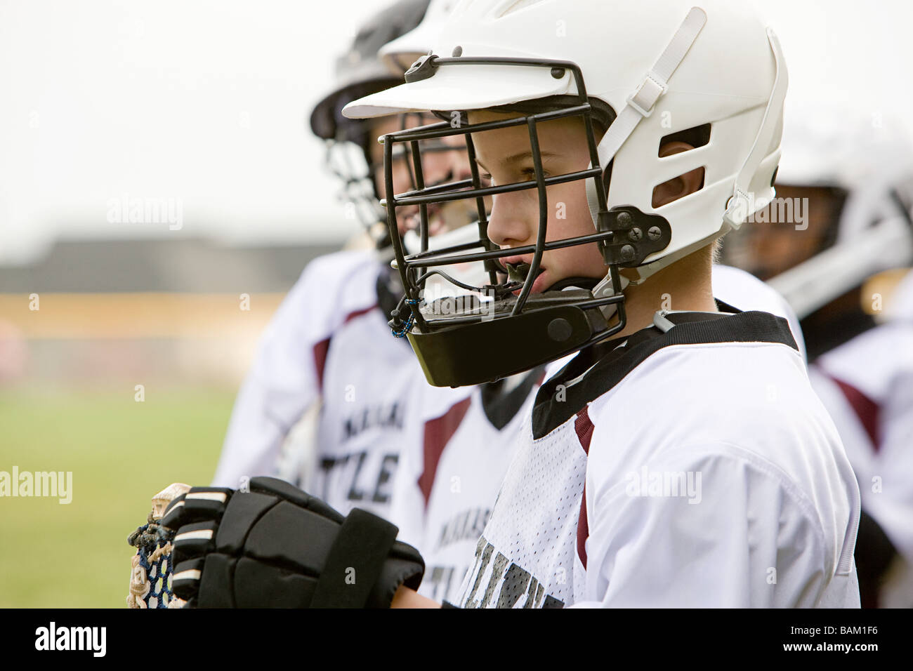 Junior Lacrosse-Spieler Stockfoto