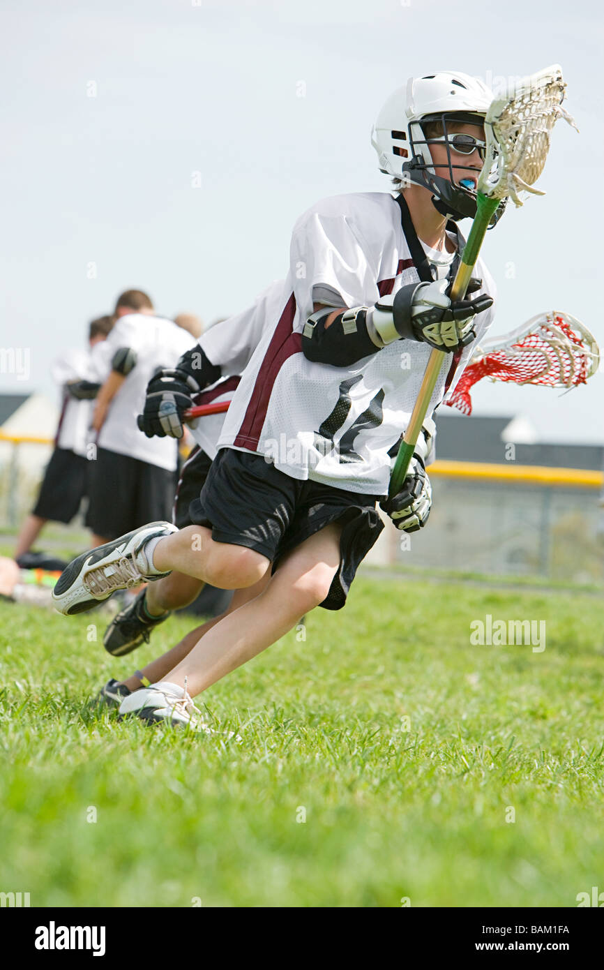 Junior Lacrosse-Spieler Stockfoto