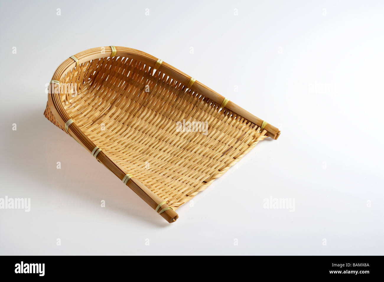 Ein Bambuslöffel wicker Stockfoto