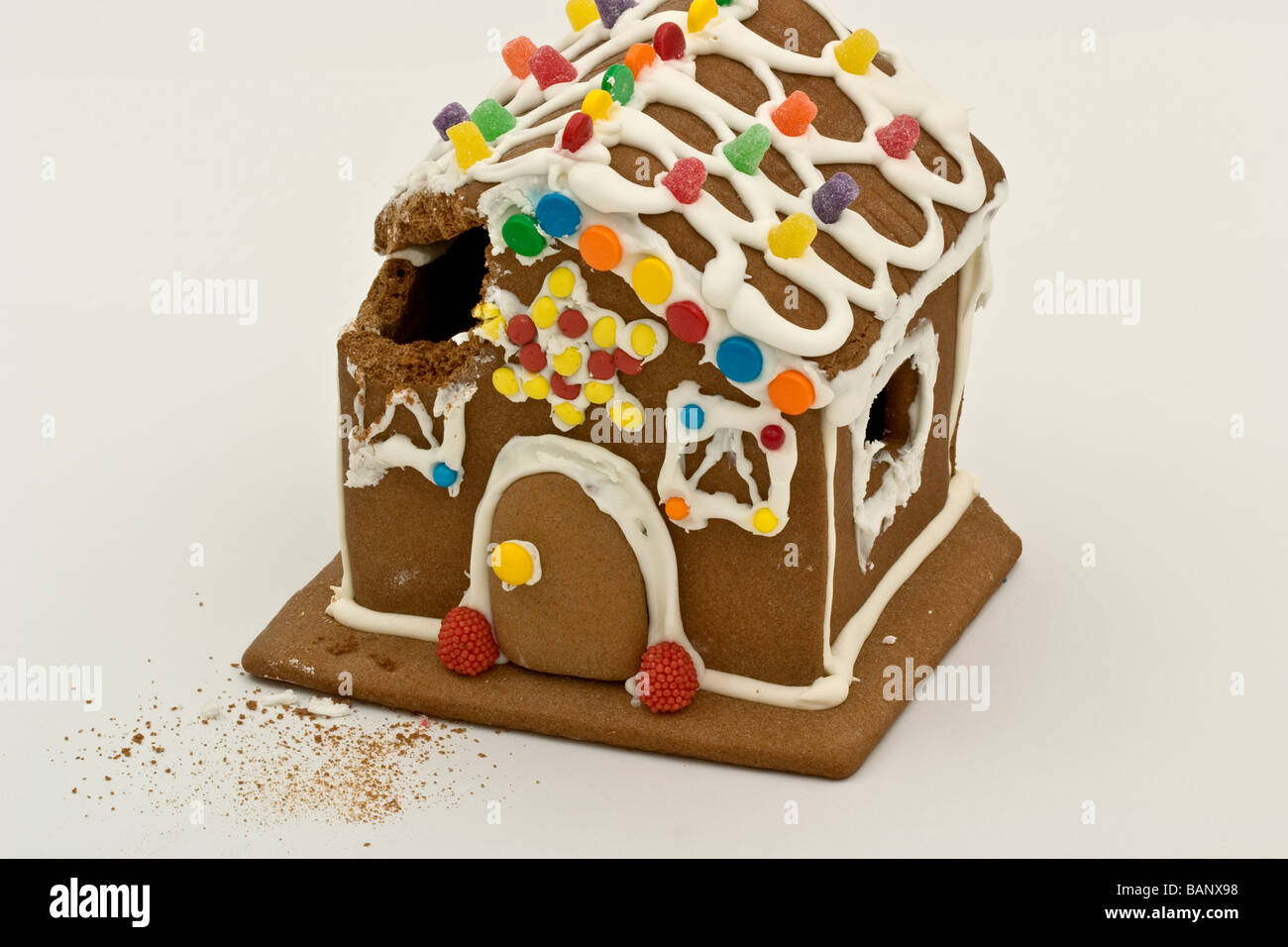 Lebkuchenhaus mit einer Ecke heraus gegessen Stockfoto