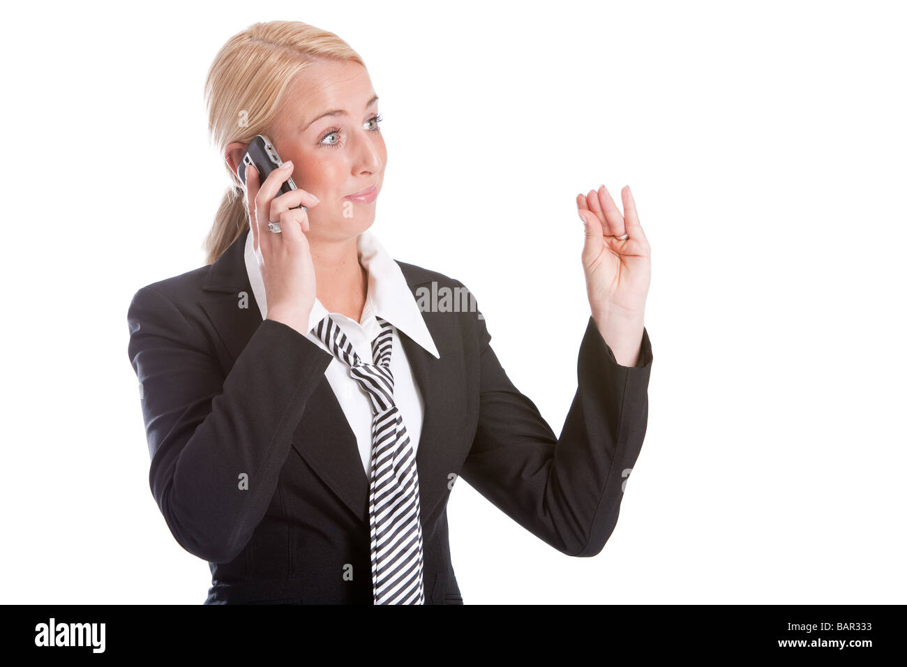 Geschäftsfrau sucht während des Gesprächs am Telefon sehr überzeugt Stockfoto