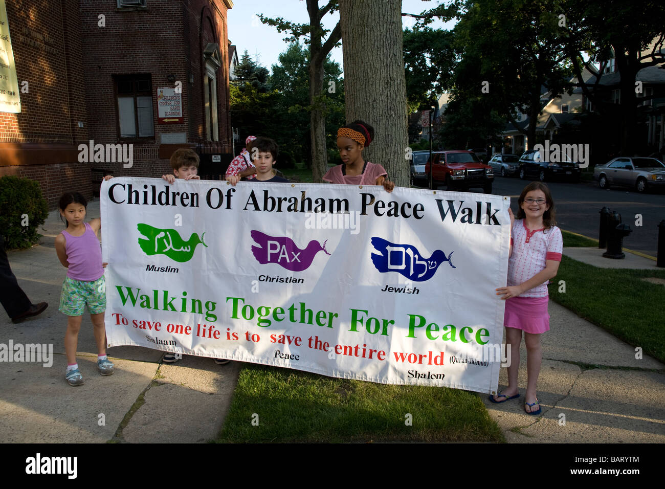 Teilnehmer in einer jährlichen interreligiösen Frieden März im Abschnitt Flatbush, Brooklyn New York Stockfoto