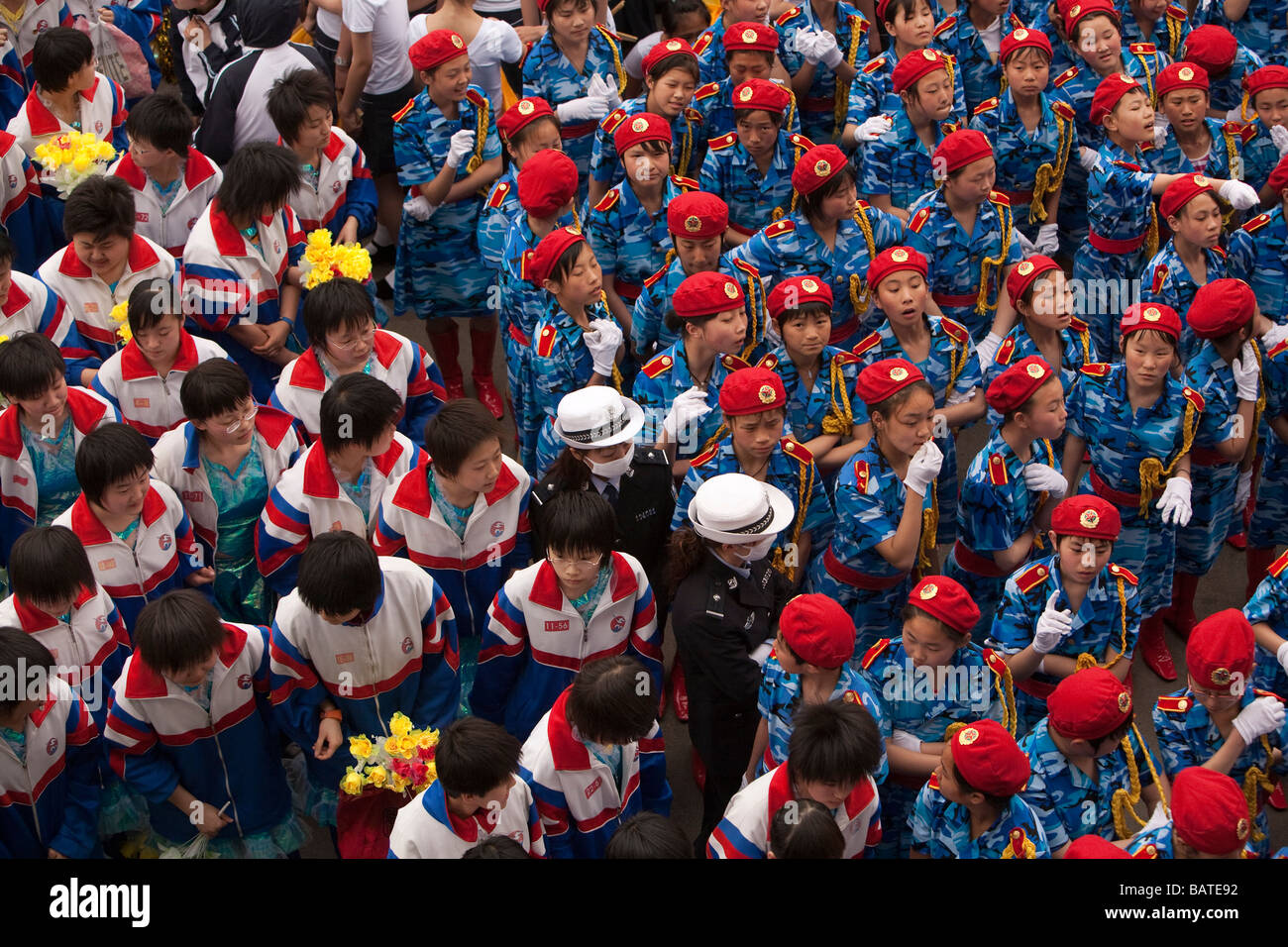 Schulkinder im City Sportstadium für eine Parade vor Parteiführern, Changchun Jilin Provinz China zu Proben. Stockfoto