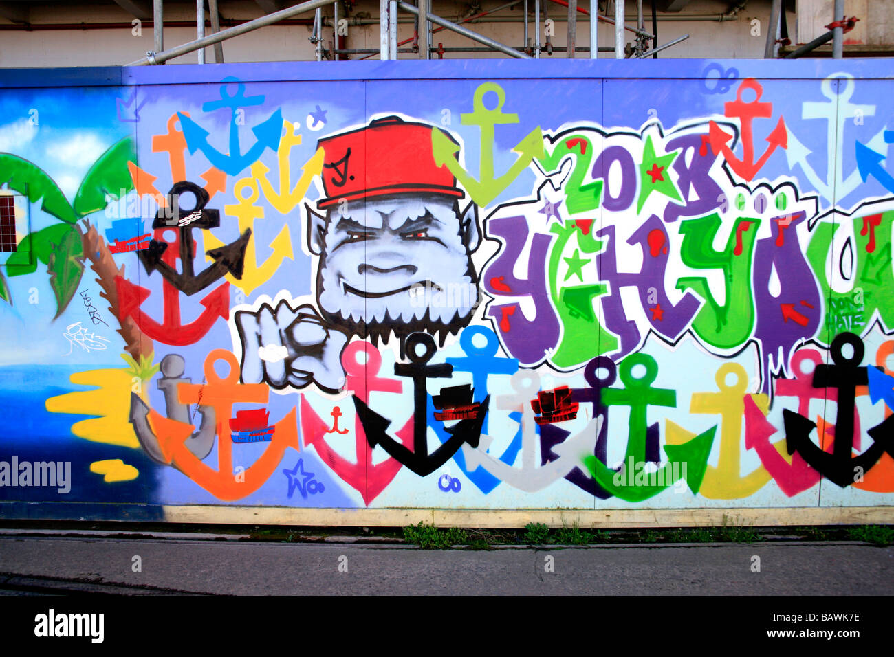 Grafitti-Kunst auf einem Zaun Stockfoto