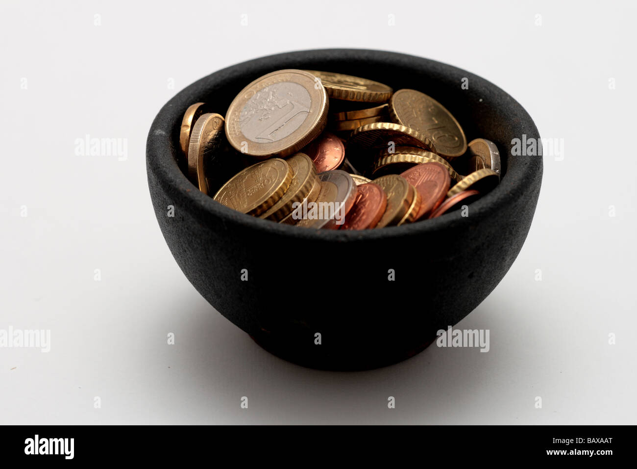 Münzen im glas Ausgeschnittene Stockfotos und -bilder - Alamy
