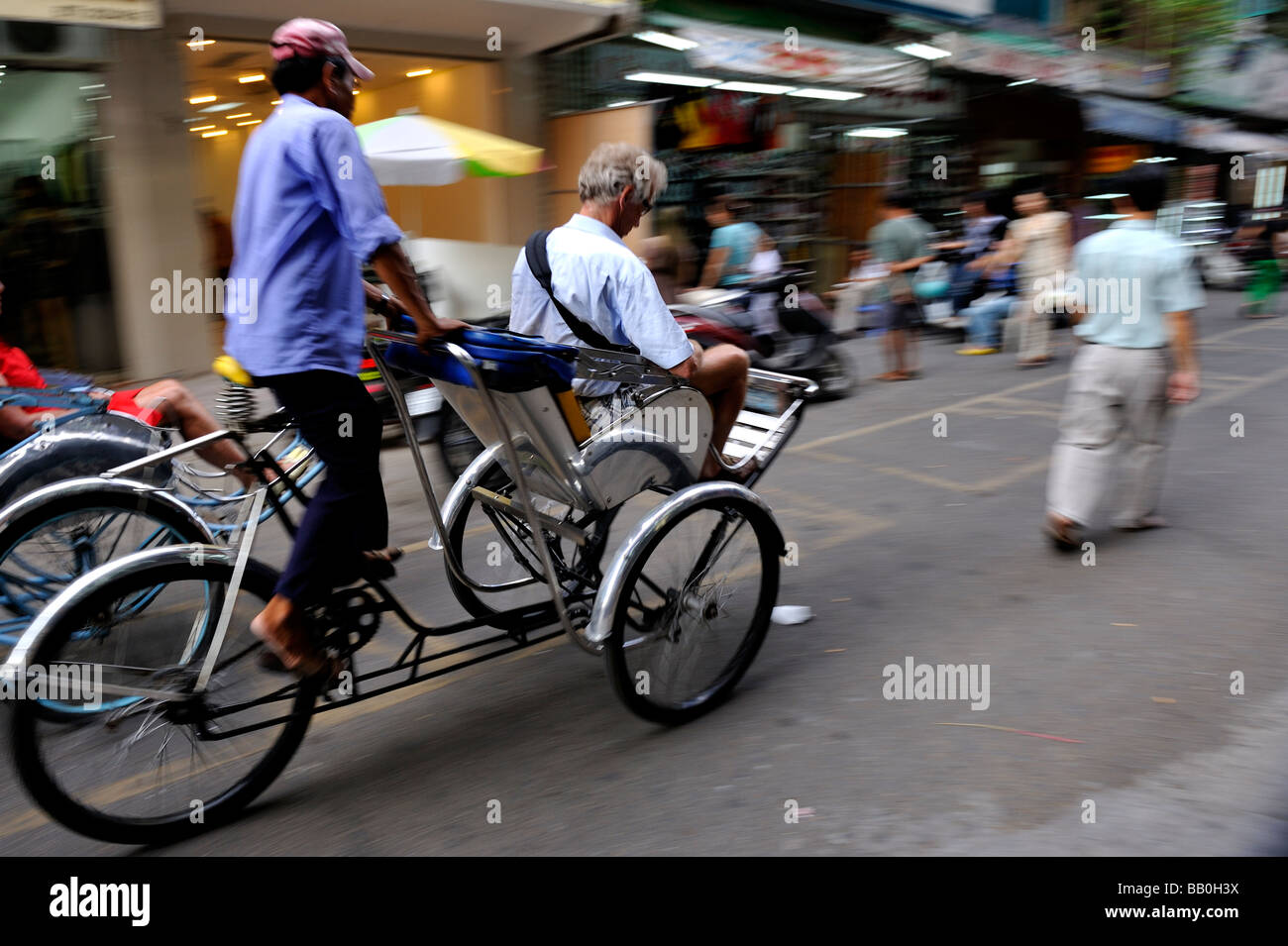Touristisches Reiten Cyclo (Velo-Rikscha). Ho-Chi-Minh-Stadt (Saigon), Vietnam Stockfoto