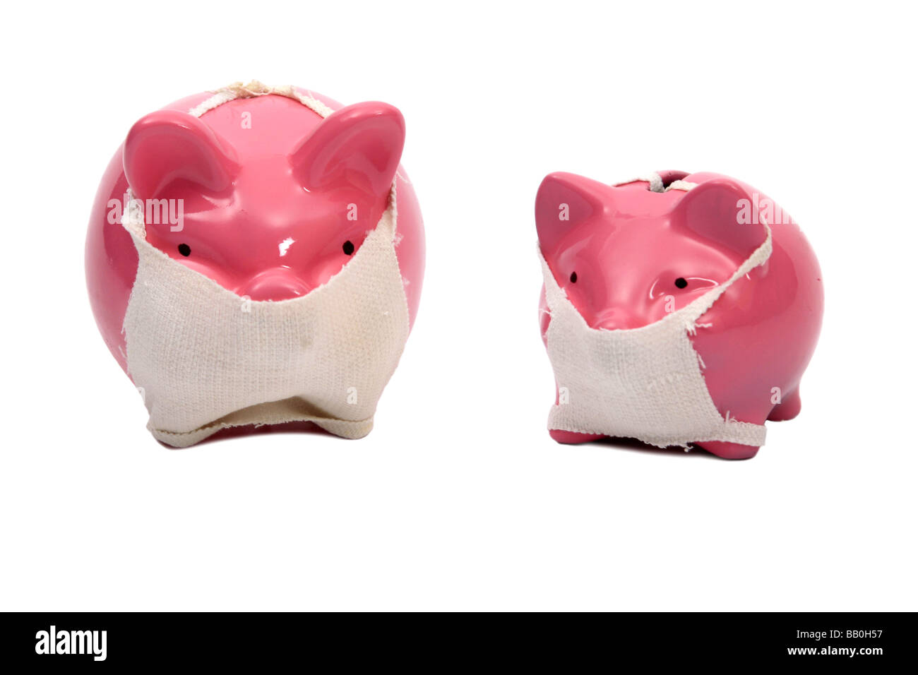 Rosa Sparschwein Schweine tragen Gesichtsmasken in bezug auf den Ausbruch der Schweinegrippe Stockfoto