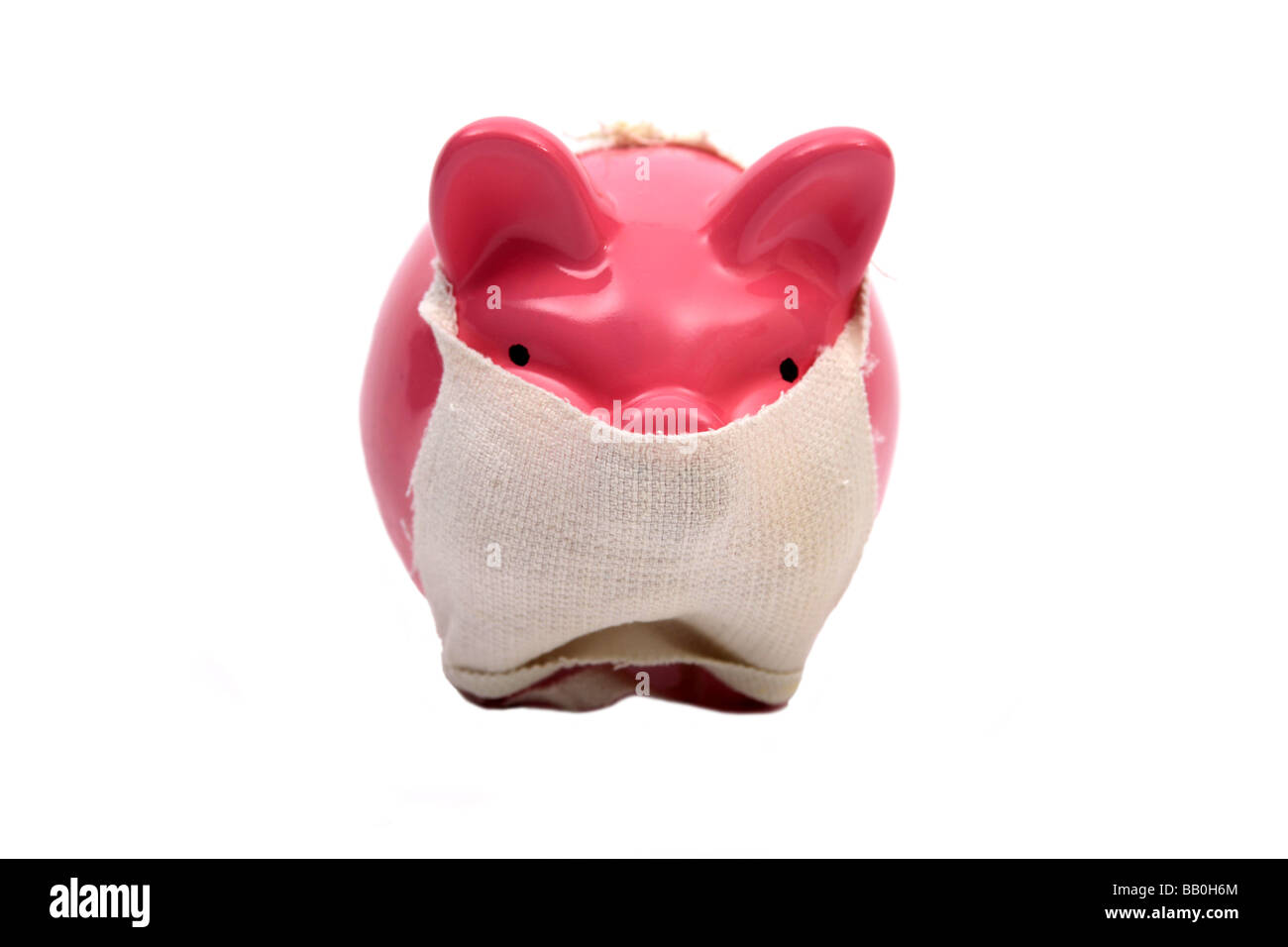 Rosa Sparschwein Schwein tragen Gesichtsmaske in bezug auf den Ausbruch der Schweinegrippe Stockfoto