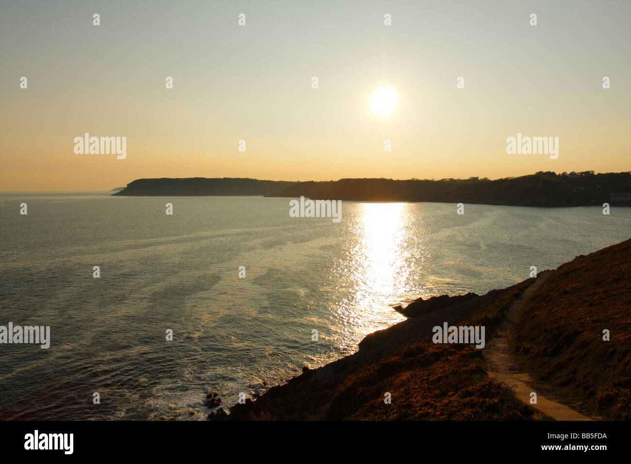 Sonnenuntergang am Langland Bucht, Gower Halbinsel, West Glamorgan, South Wales, Großbritannien Stockfoto