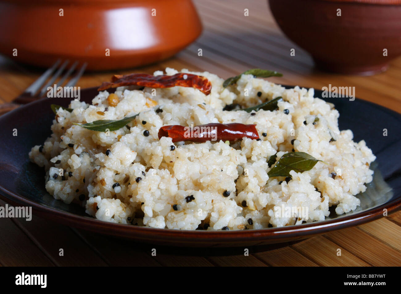 Reis-Upma ist ein Süd-indischen Frühstücksgericht. Stockfoto Reis-Upma ist ein Süd-indischen Frühstücksgericht. Stockfoto