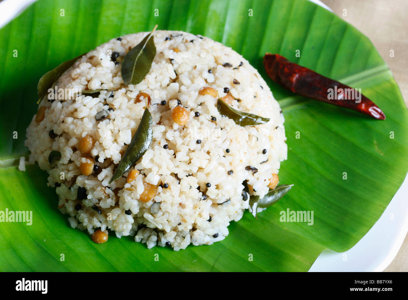 Reis-Upma ist ein Süd-indischen Frühstücksgericht. Stockfoto Reis-Upma ist ein Süd-indischen Frühstücksgericht. Stockfoto