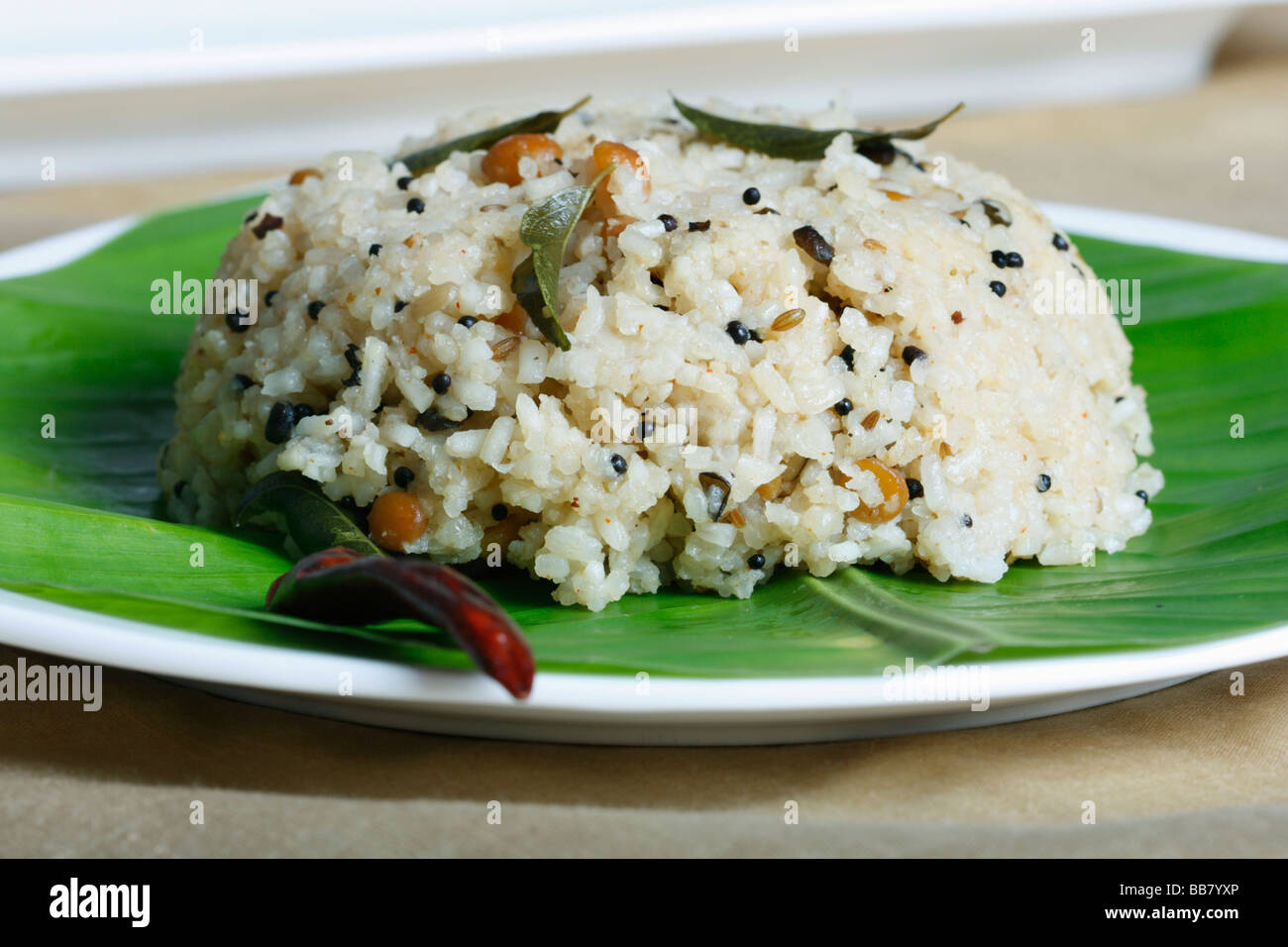 Reis-Upma ist ein Süd-indischen Frühstücksgericht. Stockfoto Reis-Upma ist ein Süd-indischen Frühstücksgericht. Stockfoto