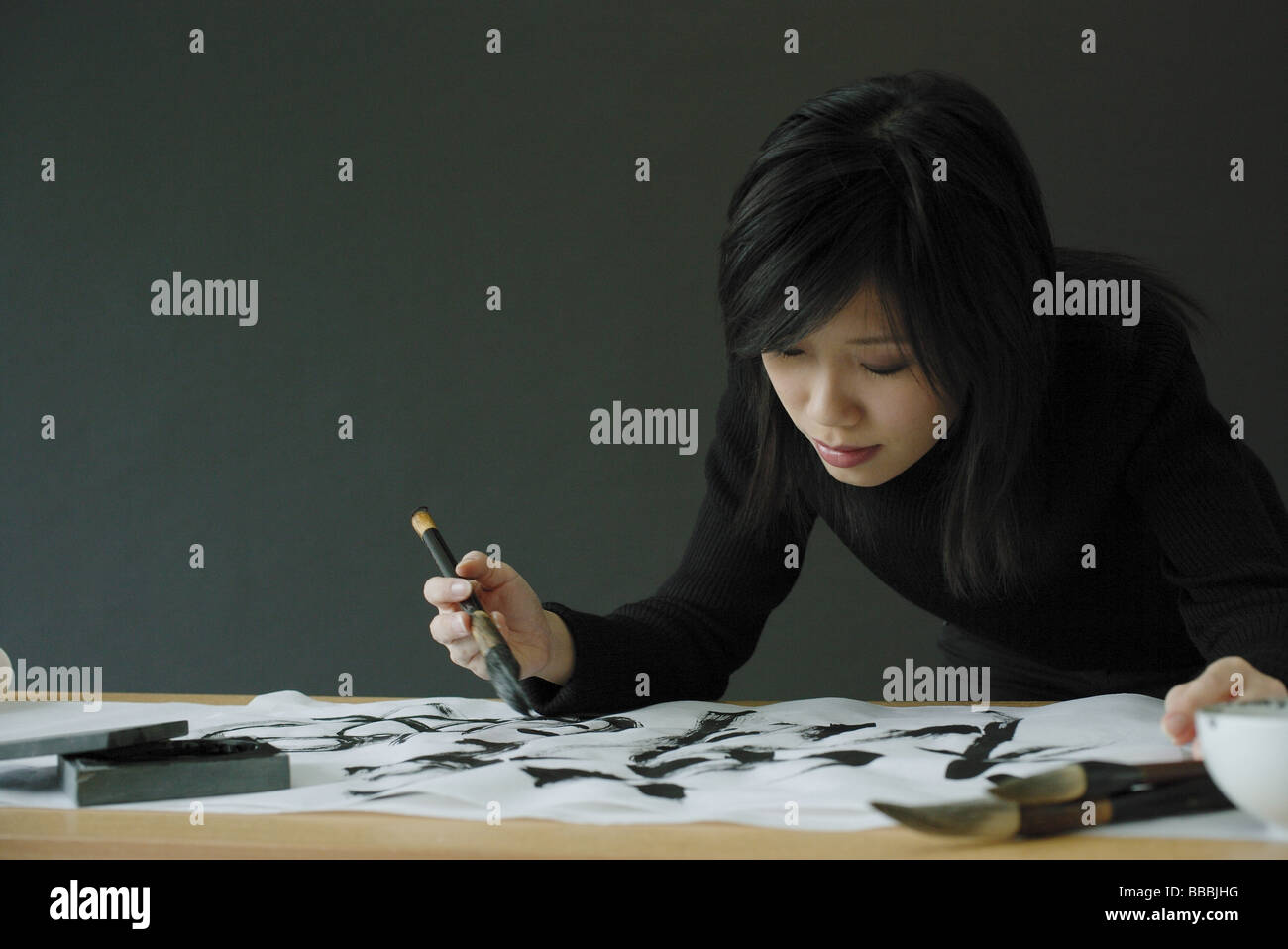 Frau Malerei chinesische Kalligraphie Stockfoto