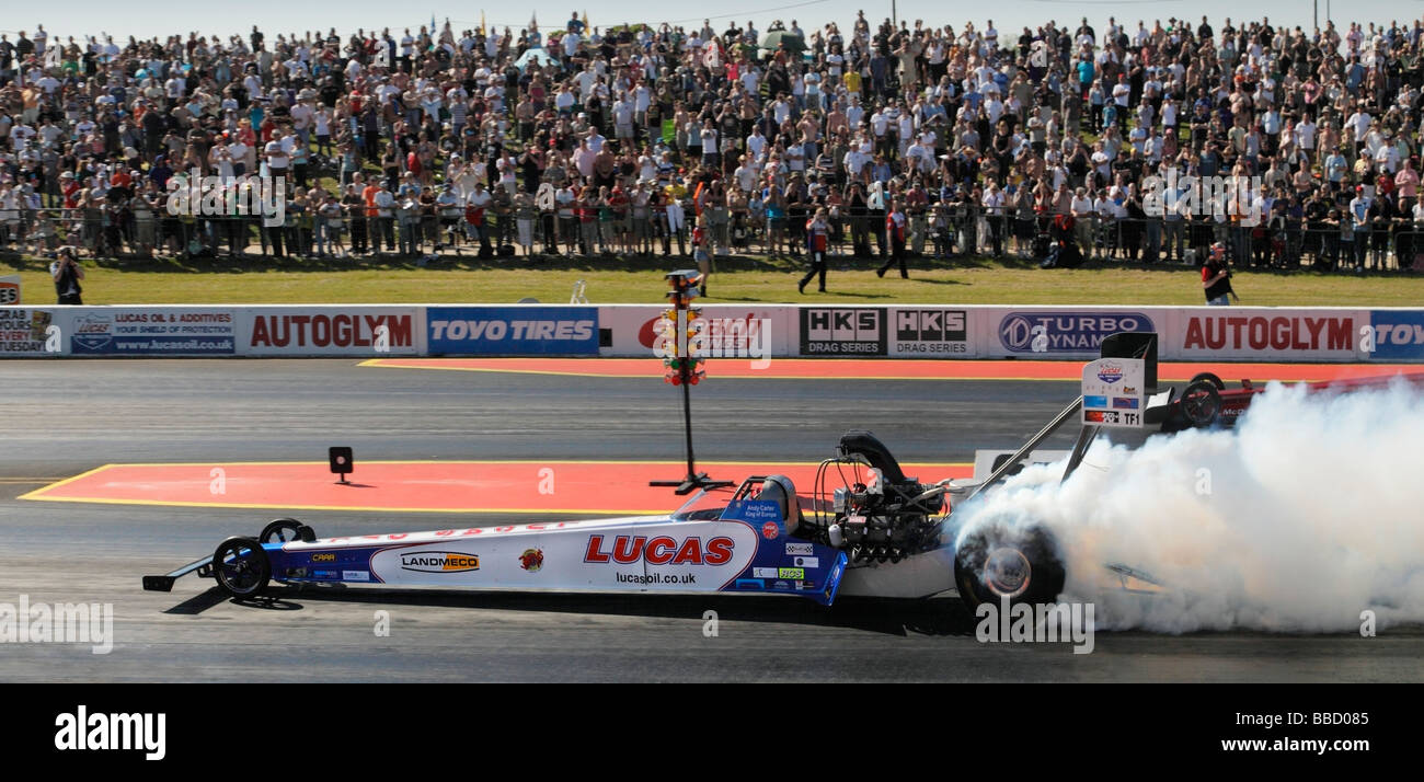 Top Fuel Dragster von Andy Carter angetrieben. Santa Pod Raceway. Stockfoto