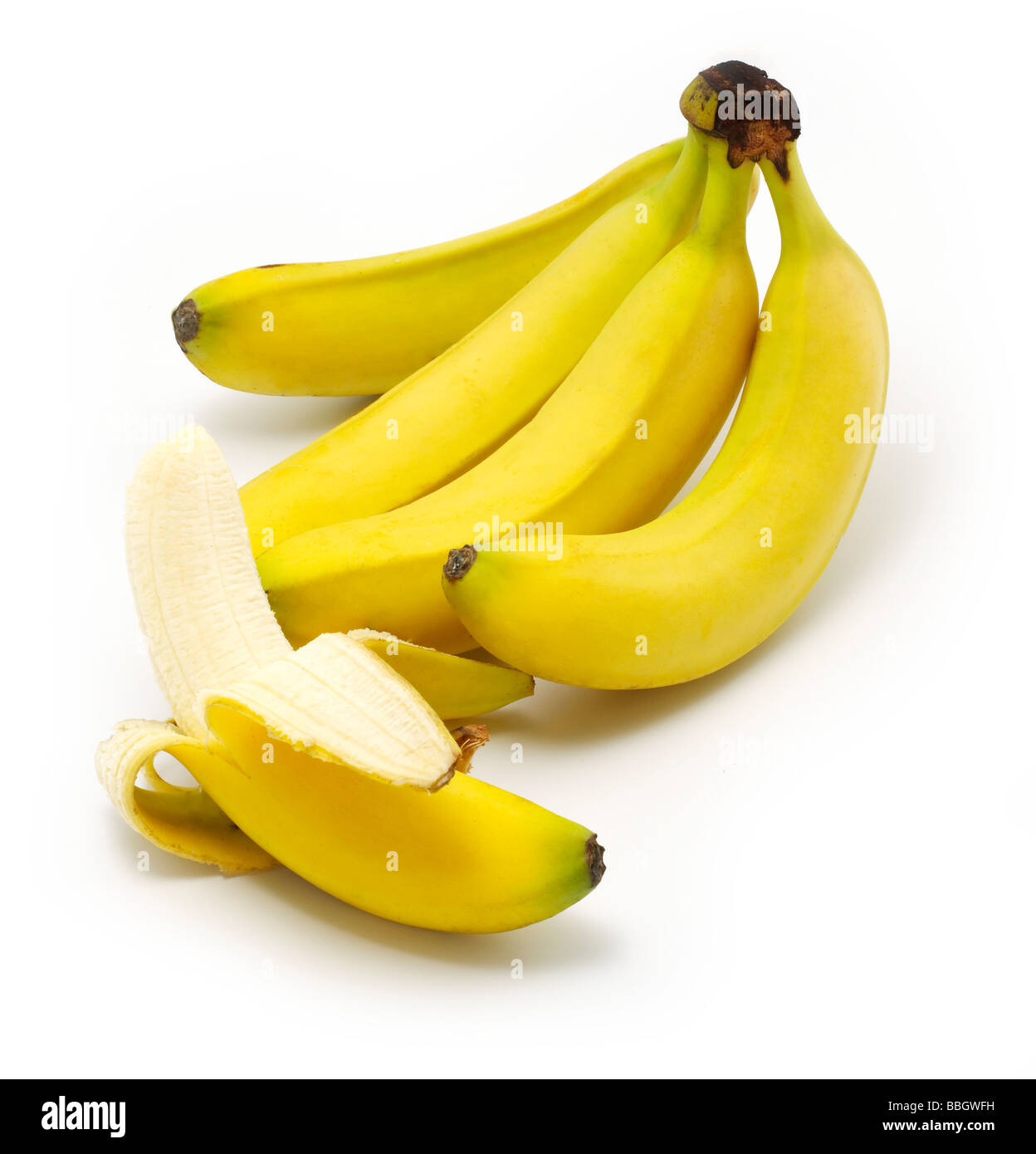 Bananen, die auf einem weißen Hintergrund ausschneiden Stockfoto