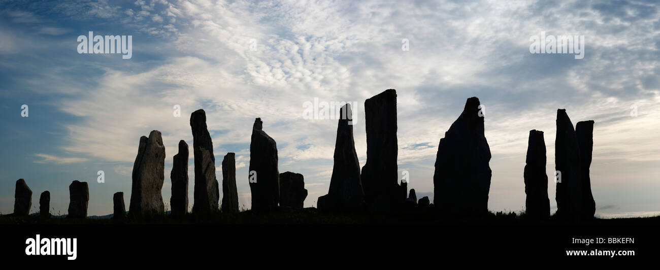 Callanish standing stones, Isle of Lewis, Äußere Hebriden, Schottland Sonnenuntergang silhouette Panoramablick Stockfoto