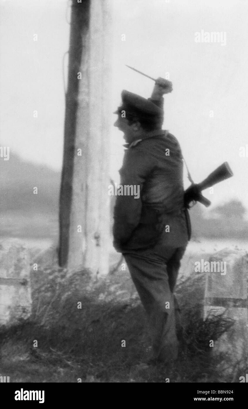 Geografie/Reisen, Deutschland, Berlin, Wall, NCO der ostdeutschen Grenztruppen versucht, einen wester-fotografen, 1964, zu erschrecken, Stockfoto