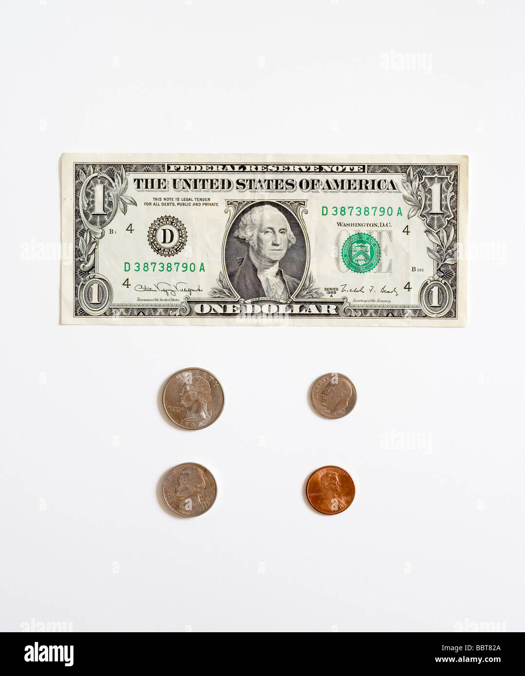 Eine Dollarnote und Münzen Stockfoto