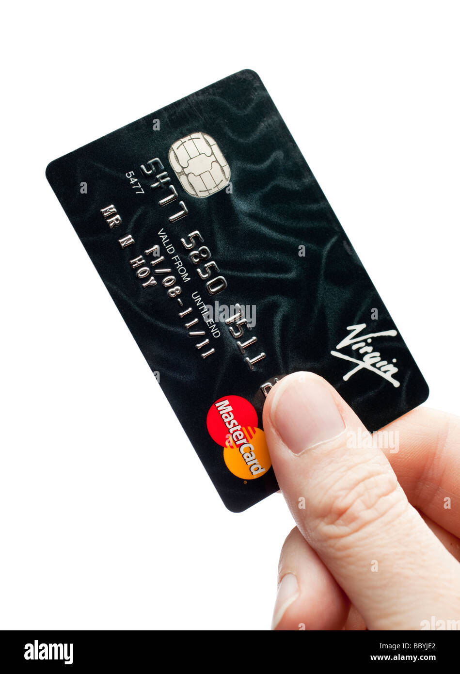Kreditkarte UK, männliche Hand Stockfoto