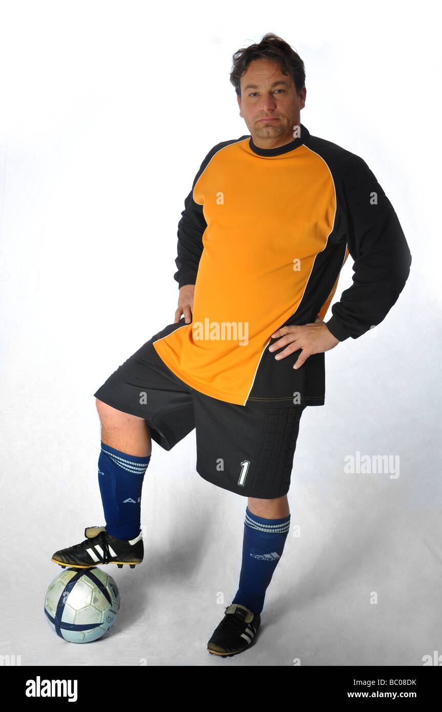 Gut aussehende Fußball oder Fotball Torhüter posiert für ein Foto Studioaufnahme Stockfoto