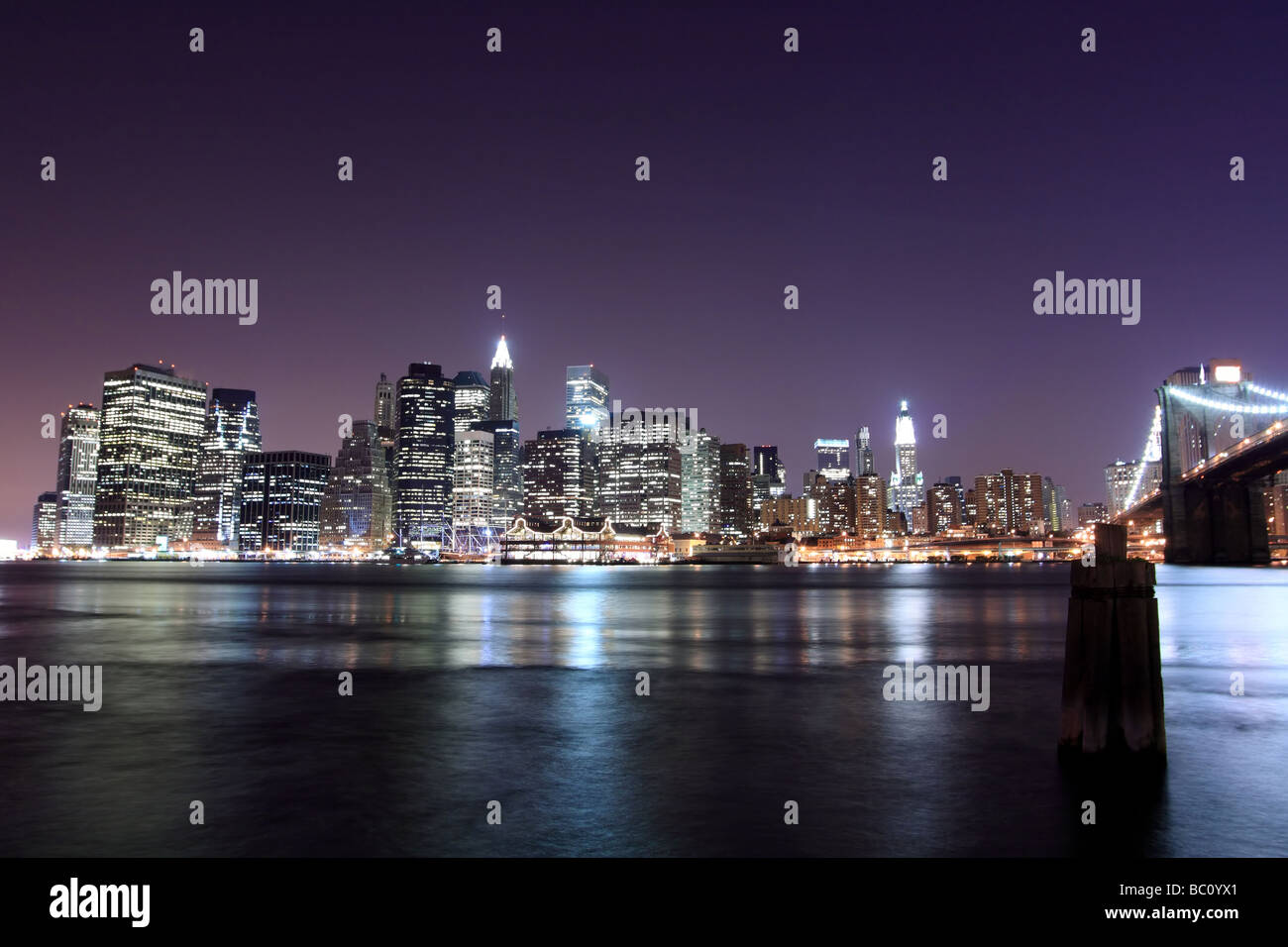 Skyline von Manhattan At Night, NYC Stockfoto