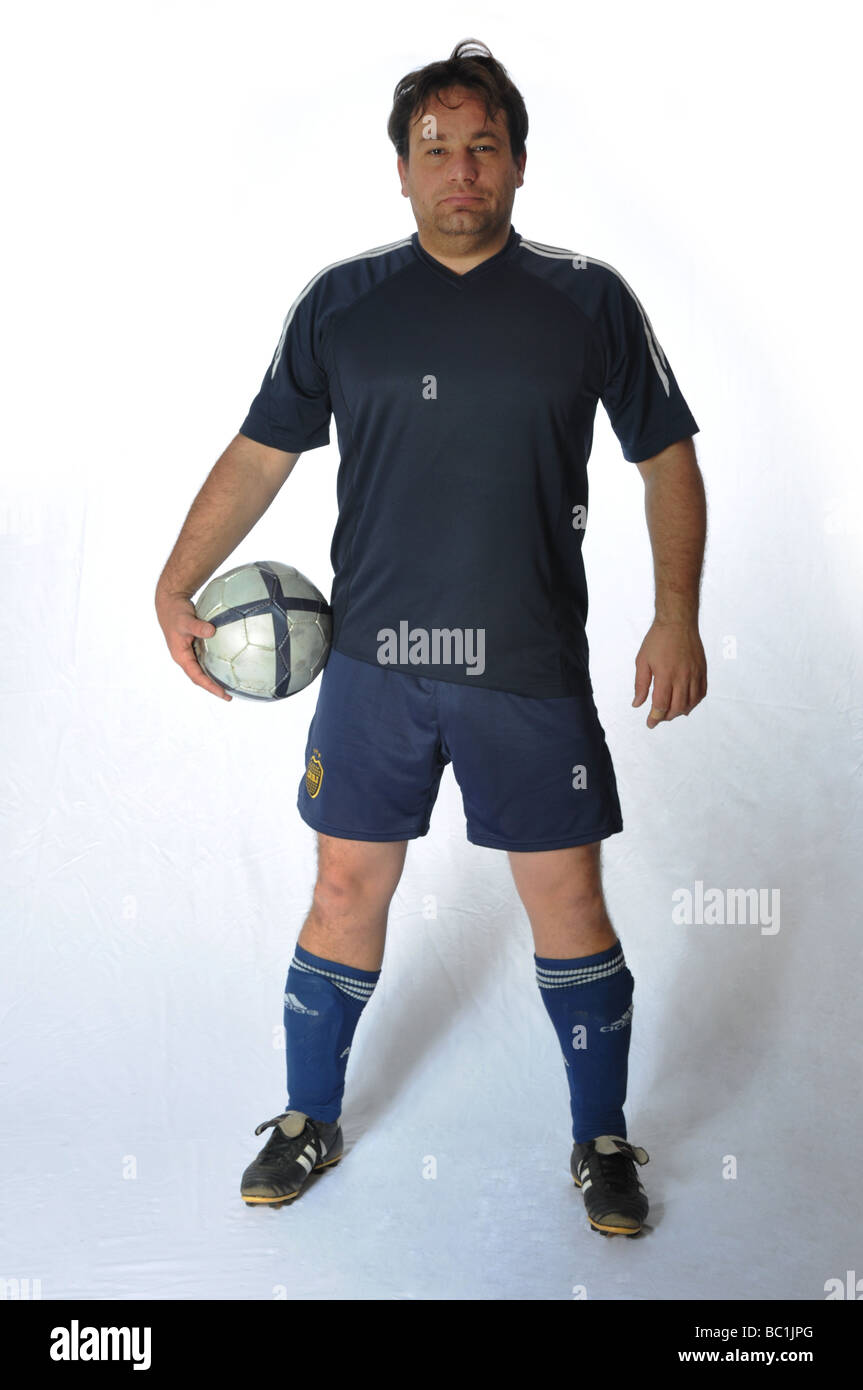 Gut aussehende Fußball oder Fotball Player posiert für ein Foto Studioaufnahme Stockfoto