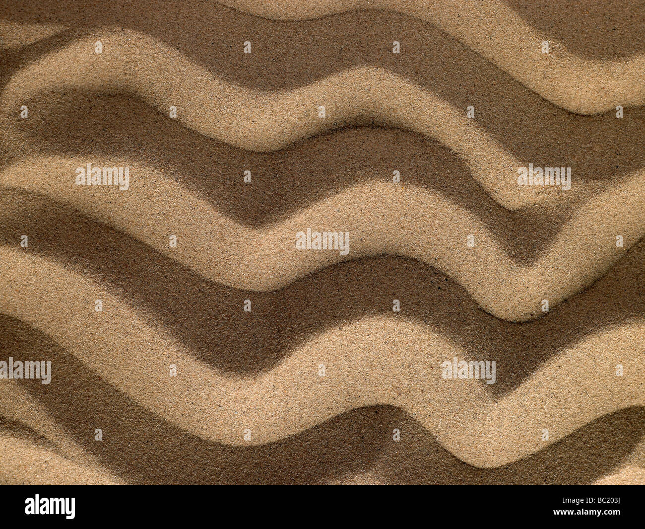 Wellige Struktur im Sand Stockfoto
