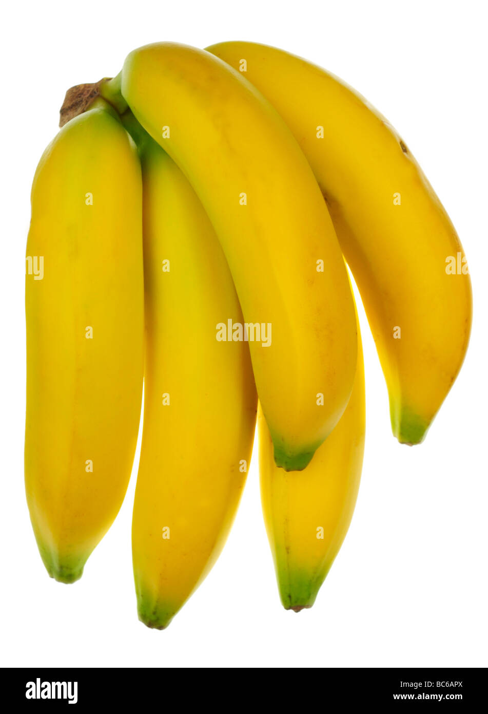 3 Bananen auf gelbem Hintergrund Stockfoto
