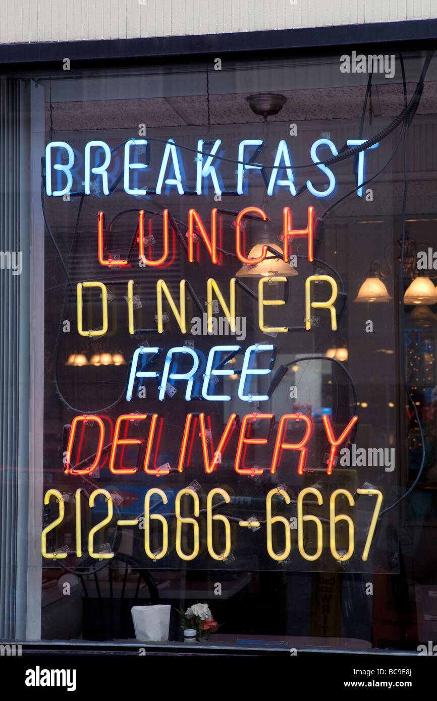 Neon Light Werbung in New York City Stockfoto
