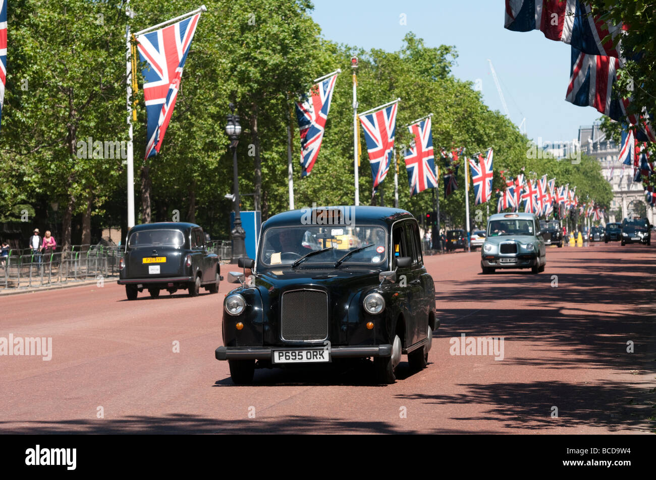 London-Taxi an der Mall, England UK Stockfoto