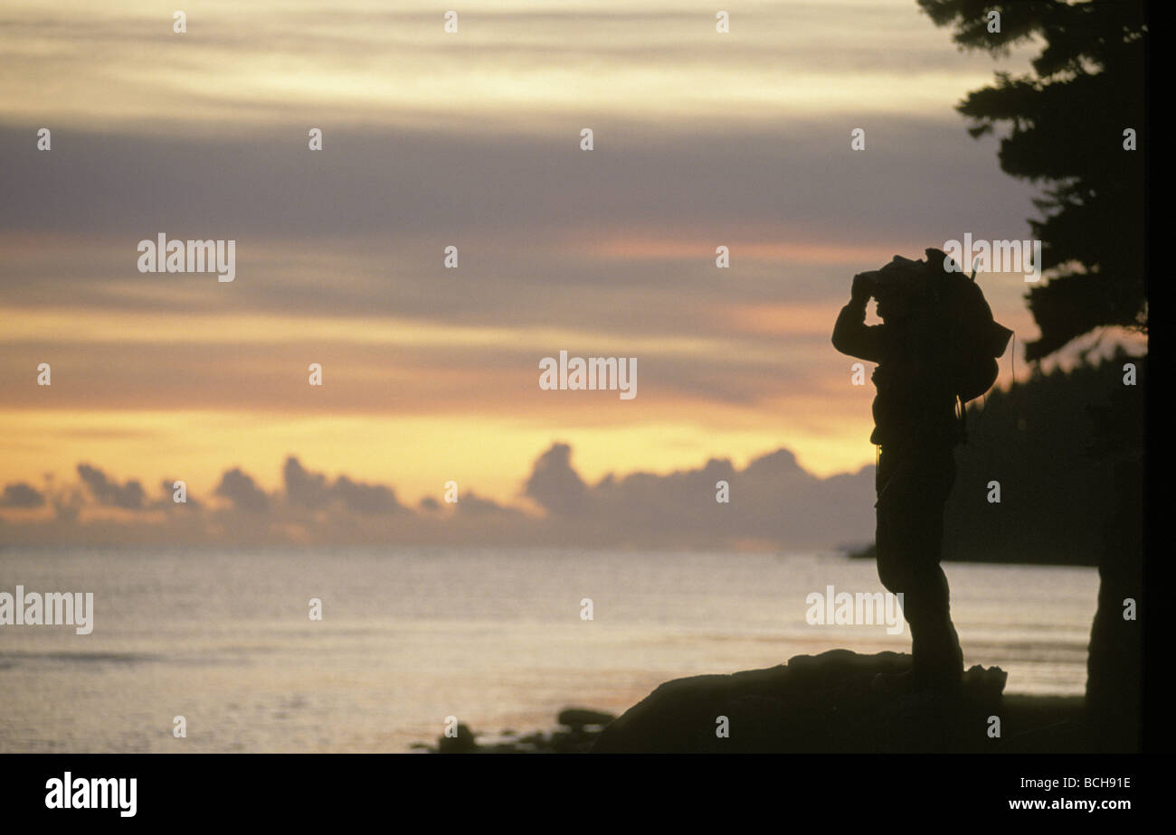 Hunter @ Sonnenuntergang am Ufer Afognak ist SW AK Stockfoto