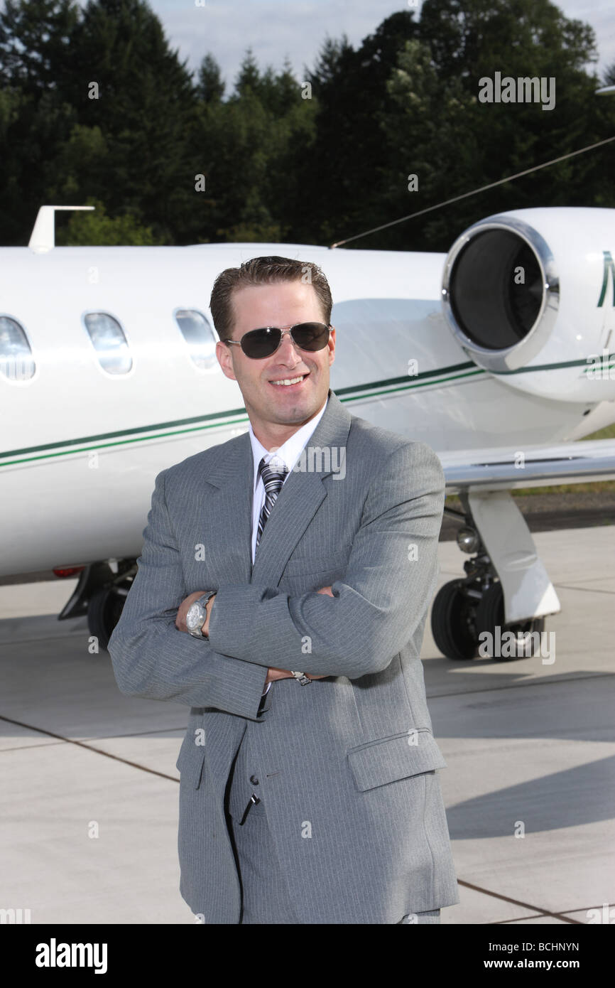 Geschäftsmann mit corporate Jets Stockfoto