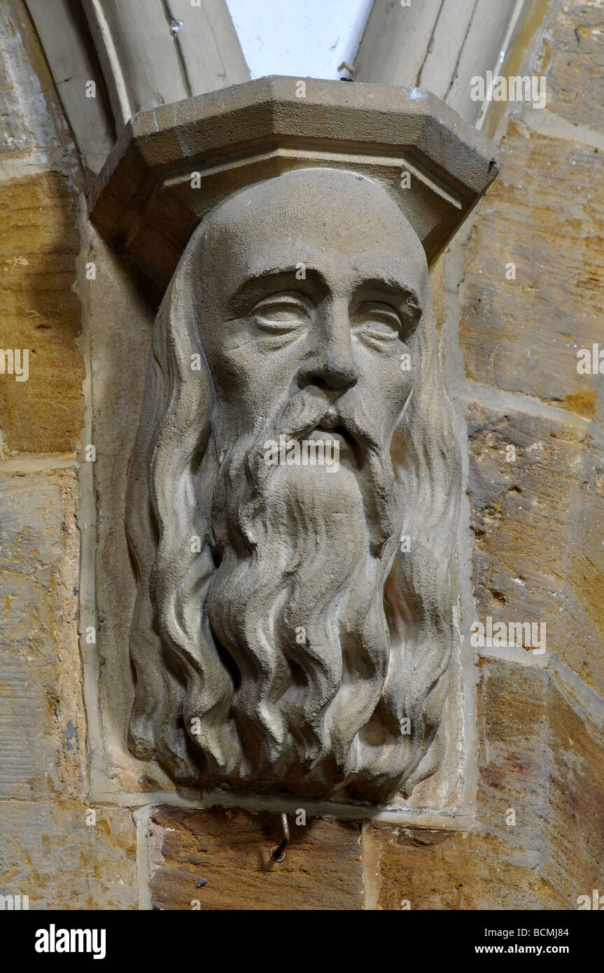 Bärtiger Mann an Wand in St. Mary die Jungfrau Kirche, Culworth, Northamptonshire, England, UK Stockfoto